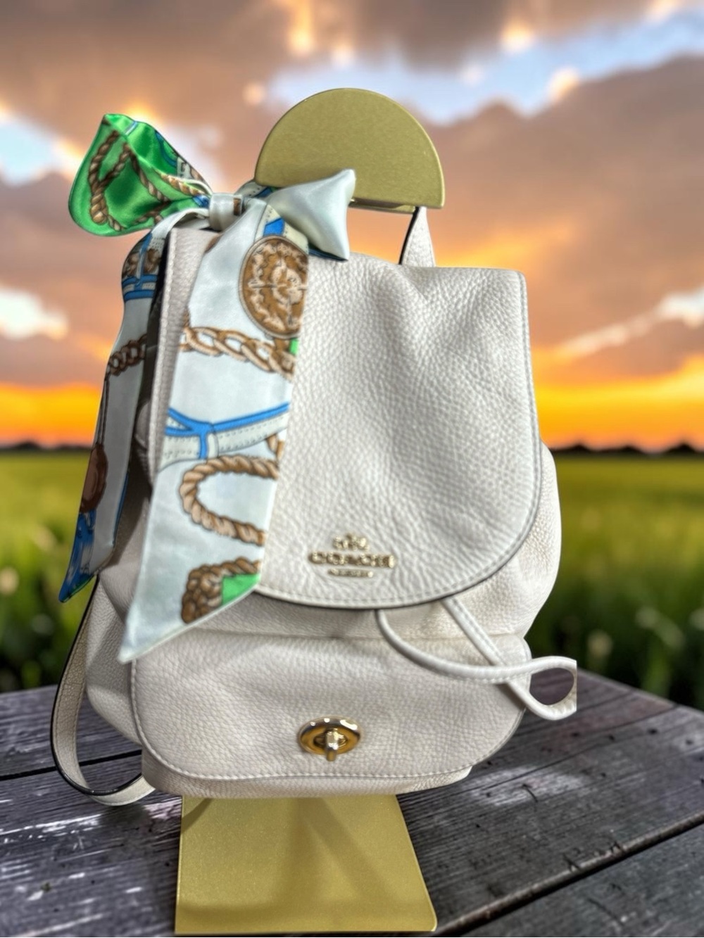 Coach White Pebbled Leather Drawstring Backpack with Scarf Accent